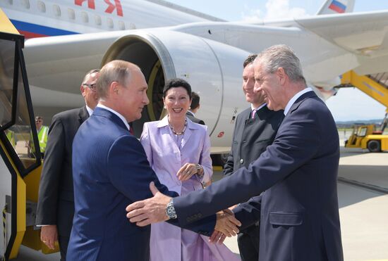 Russian President Vladimir Putin pays a visit to Austria