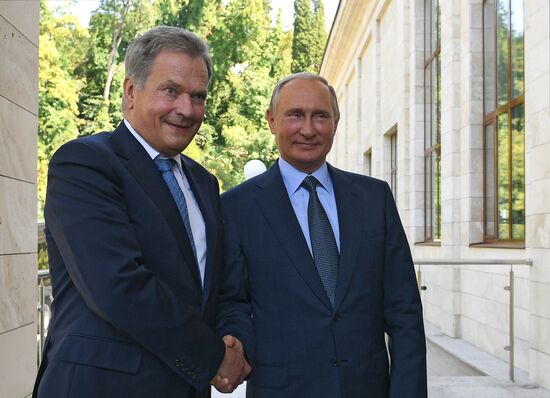 Russian President Vladimir Putin meets with Finnish President Sauli Niinisto