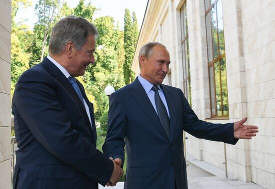 Russian President Vladimir Putin meets with Finnish President Sauli Niinisto