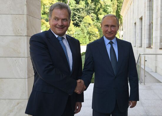 Russian President Vladimir Putin meets with Finnish President Sauli Niinisto