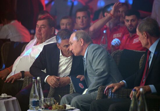 Vladimir Putin attends international combat sambo tournament
