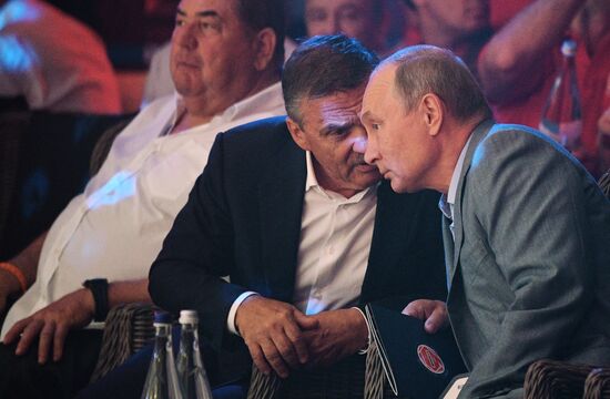 Vladimir Putin attends international combat sambo tournament