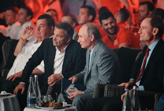 Vladimir Putin attends international combat sambo tournament