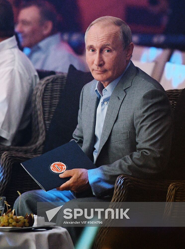 Vladimir Putin attends international combat sambo tournament
