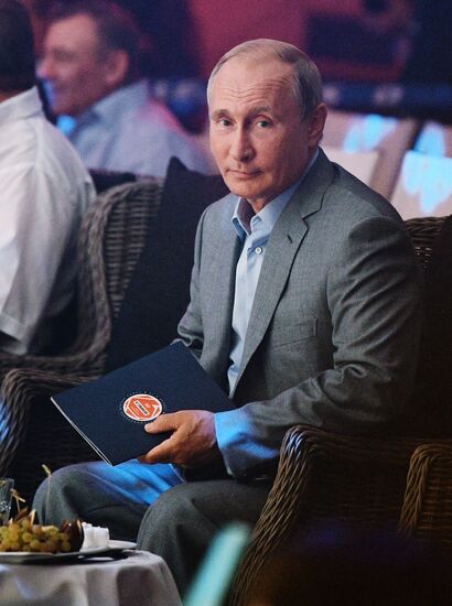 Vladimir Putin attends international combat sambo tournament