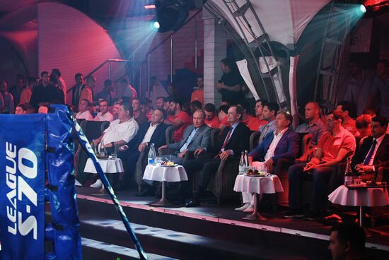 Vladimir Putin attends international combat sambo tournament