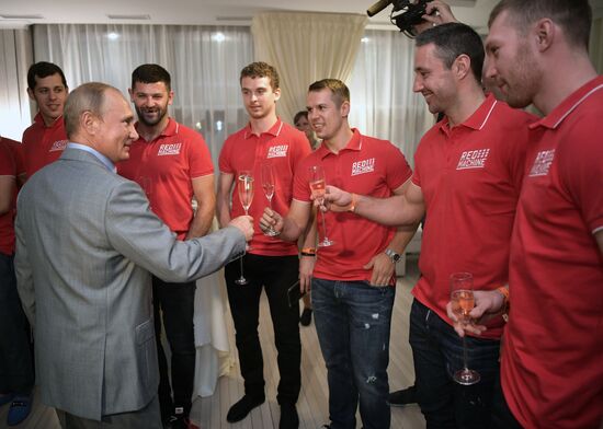 Vladimir Putin attends international combat sambo tournament