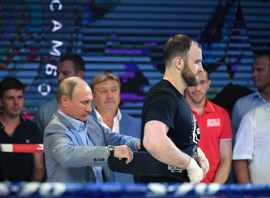 Vladimir Putin attends international combat sambo tournament
