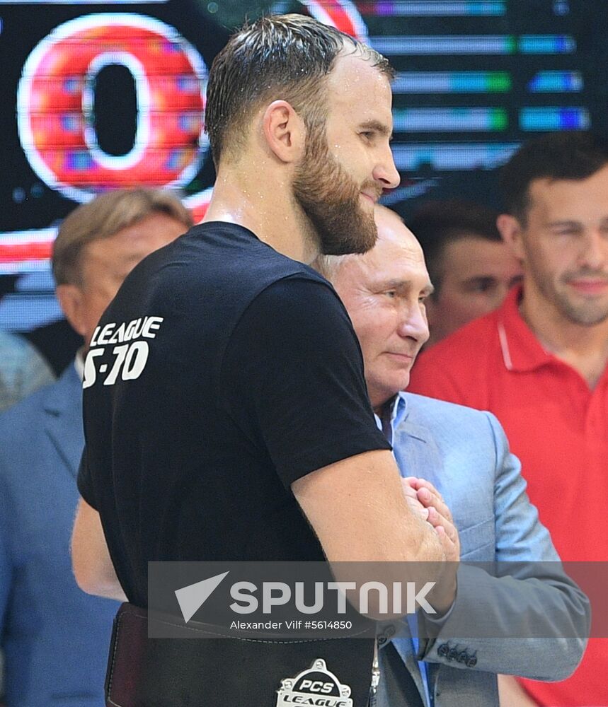 Vladimir Putin attends international combat sambo tournament