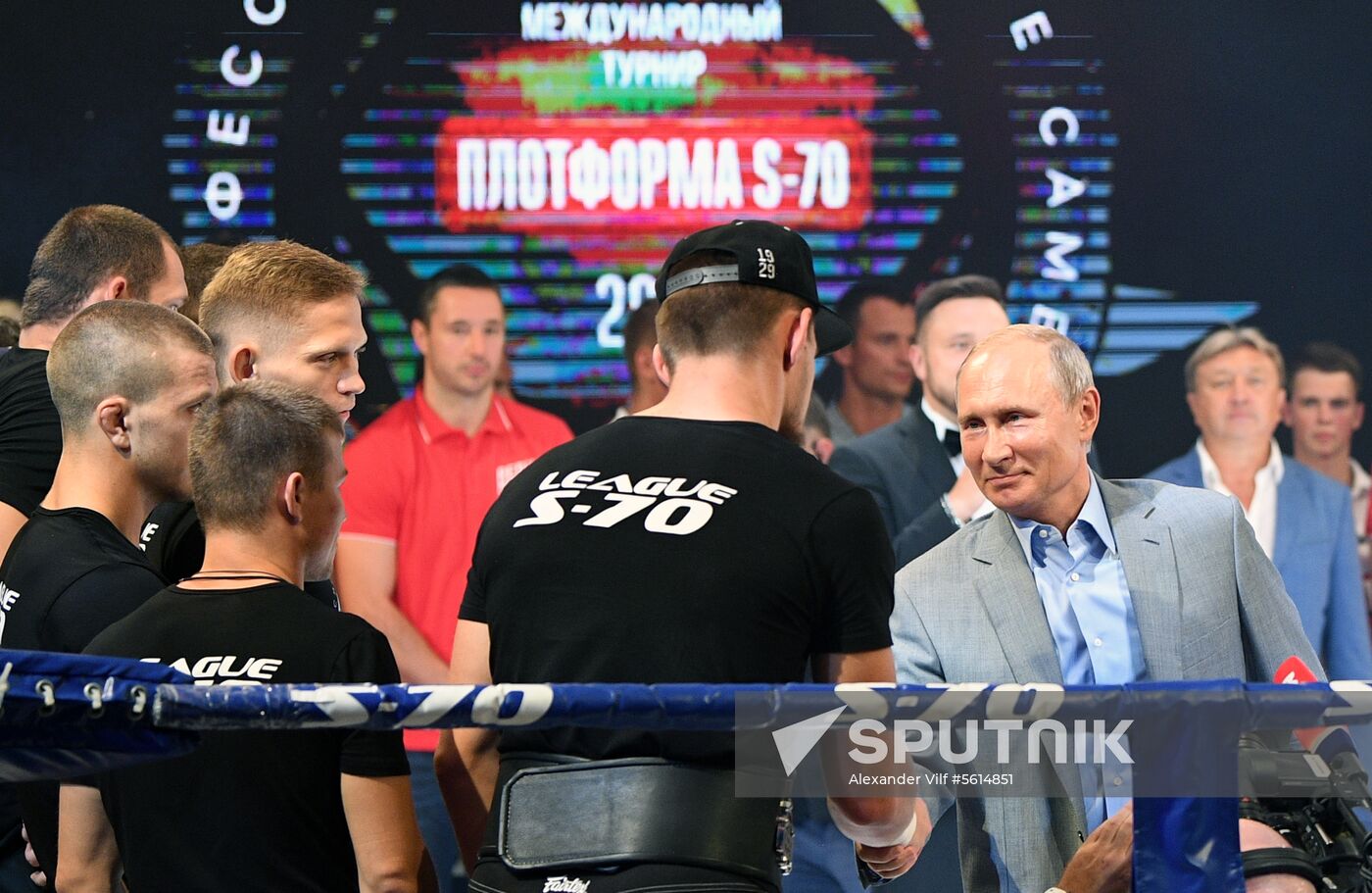 Vladimir Putin attends international combat sambo tournament