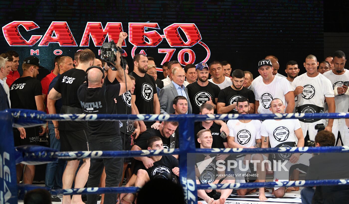 Vladimir Putin attends international combat sambo tournament
