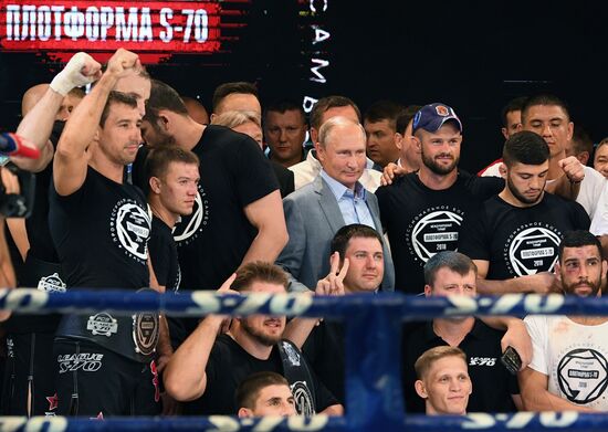 Vladimir Putin attends international combat sambo tournament