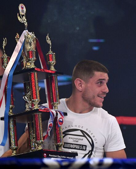 Vladimir Putin attends international combat sambo tournament