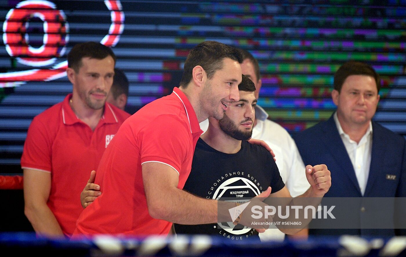 Vladimir Putin attends international combat sambo tournament