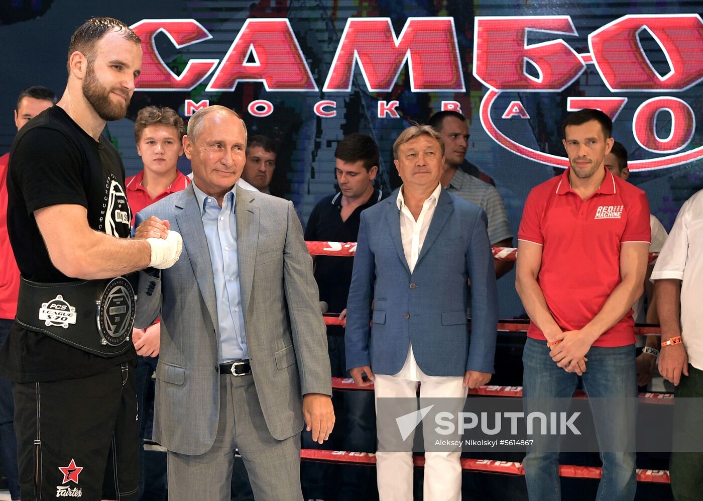 Vladimir Putin attends international combat sambo tournament