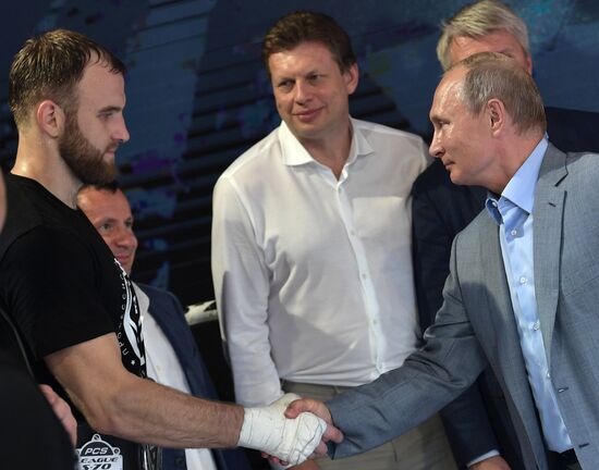Vladimir Putin attends international combat sambo tournament