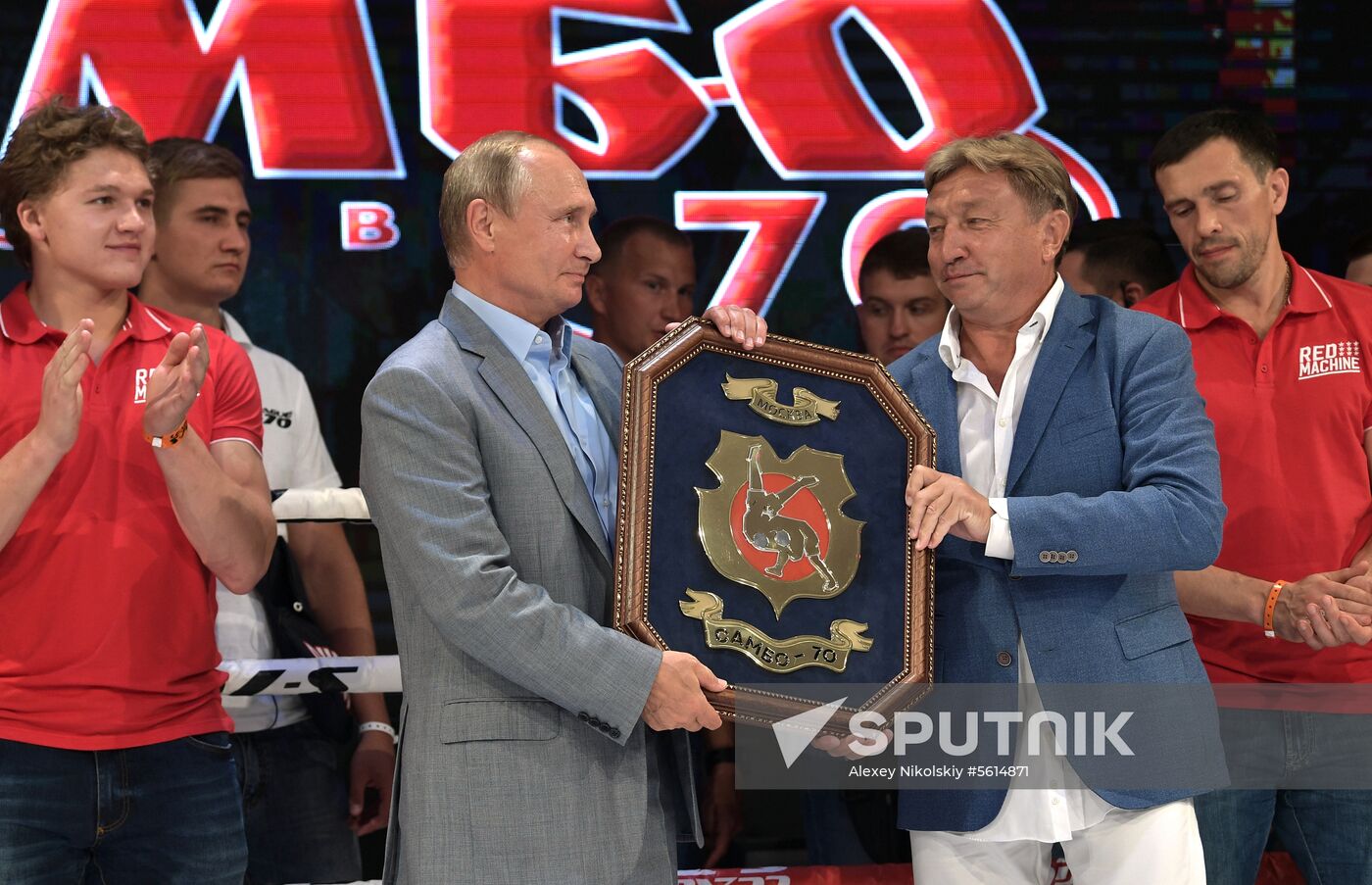 Vladimir Putin attends international combat sambo tournament