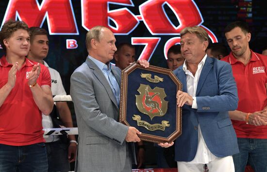 Vladimir Putin attends international combat sambo tournament