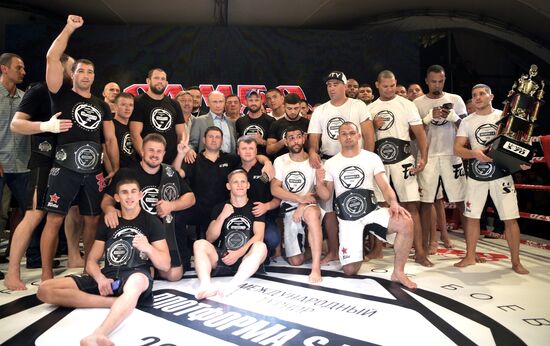 Vladimir Putin attends international combat sambo tournament