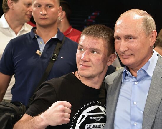 Vladimir Putin attends international combat sambo tournament