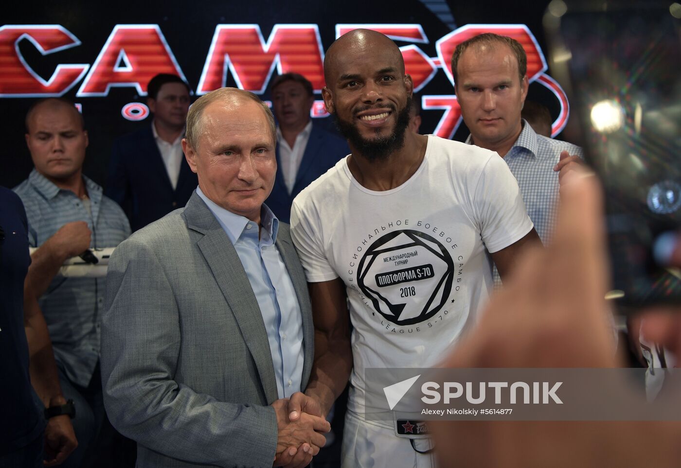 Vladimir Putin attends international combat sambo tournament