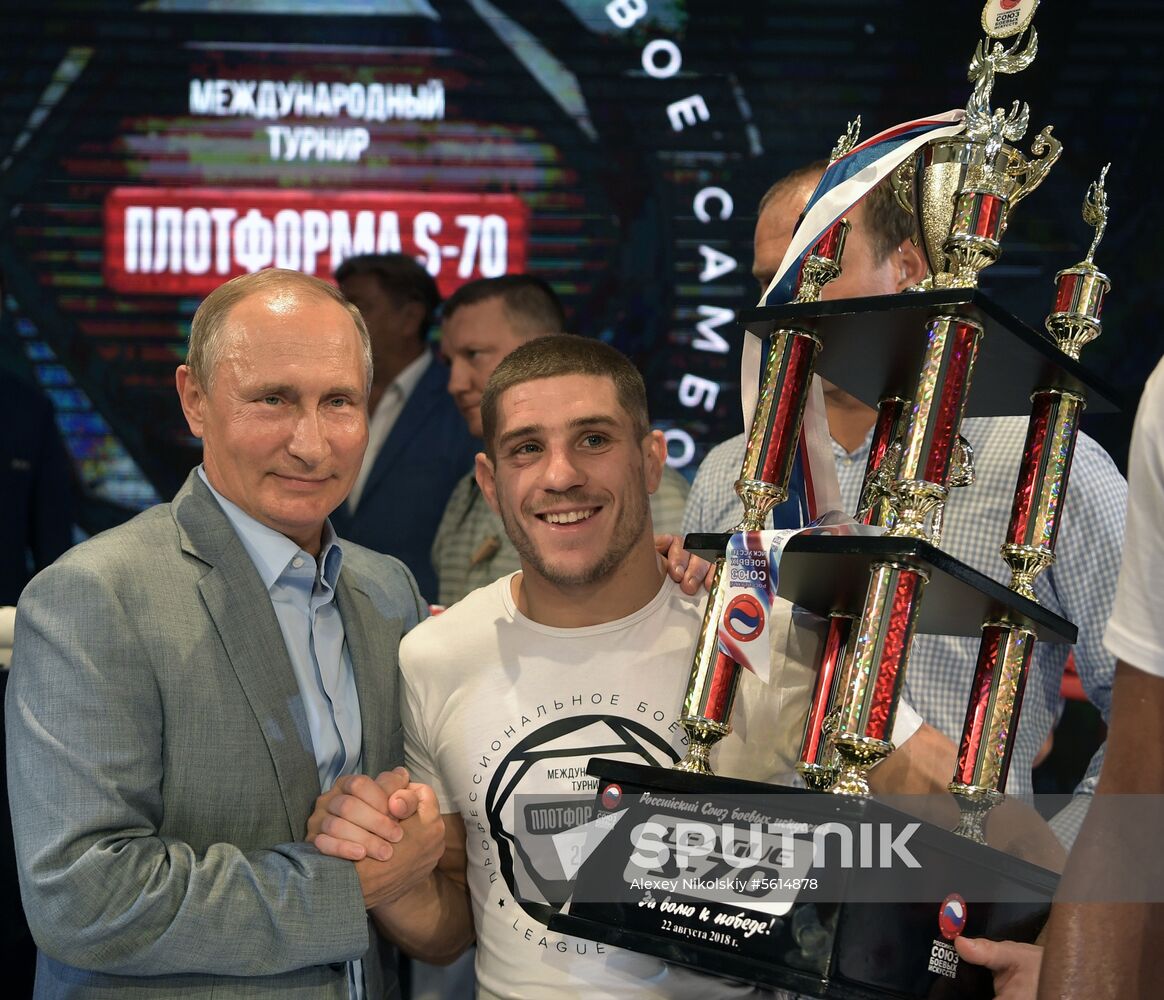 Vladimir Putin attends international combat sambo tournament