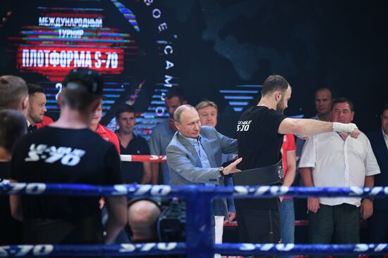 Vladimir Putin attends international combat sambo tournament