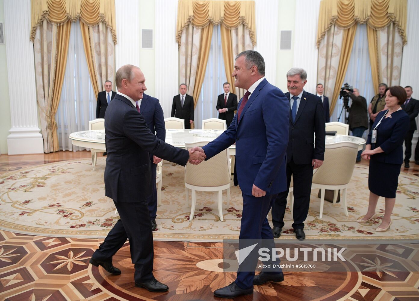 Russian President Vladimir Putin meets with President of the Republic of Abkhazia Raul Khadzhimba and President of South Ossetia Anatoly Bibilov
