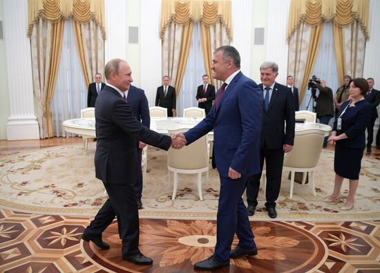 Russian President Vladimir Putin meets with President of the Republic of Abkhazia Raul Khadzhimba and President of South Ossetia Anatoly Bibilov