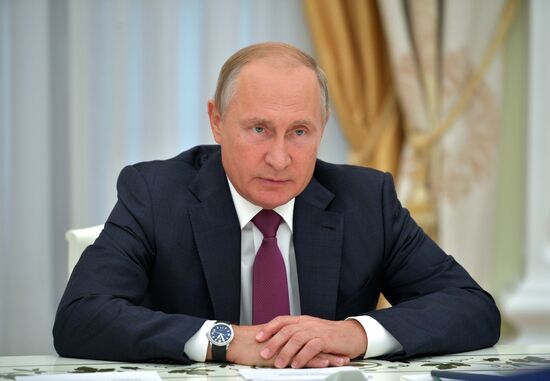 Russian President Vladimir Putin meets with President of the Republic of Abkhazia Raul Khadzhimba and President of South Ossetia Anatoly Bibilov