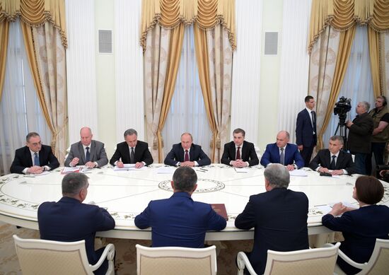 Russian President Vladimir Putin meets with President of the Republic of Abkhazia Raul Khadzhimba and President of South Ossetia Anatoly Bibilov