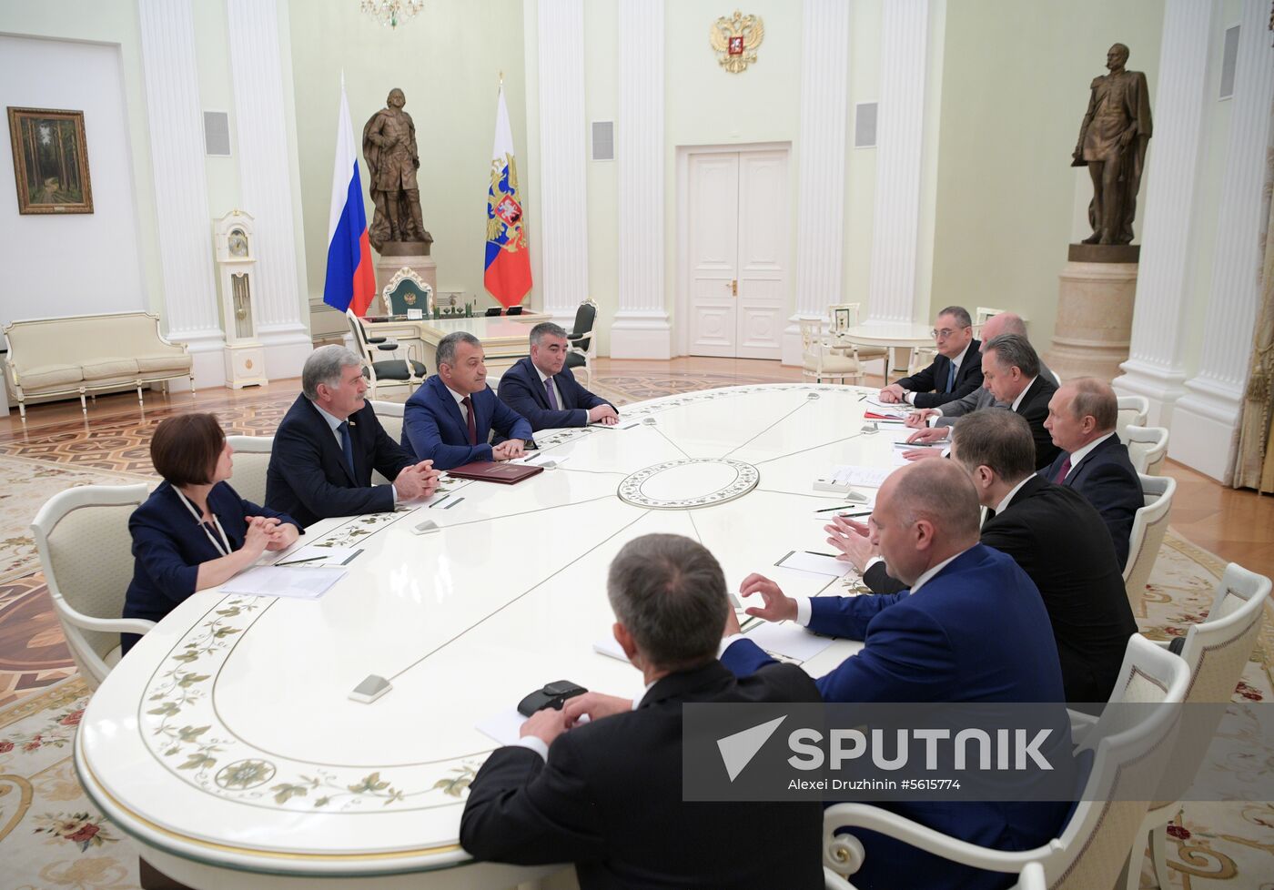 Russian President Vladimir Putin meets with President of the Republic of Abkhazia Raul Khadzhimba and President of South Ossetia Anatoly Bibilov