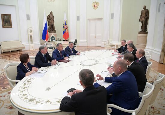 Russian President Vladimir Putin meets with President of the Republic of Abkhazia Raul Khadzhimba and President of South Ossetia Anatoly Bibilov
