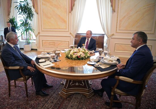 Russian President Vladimir Putin meets with President of the Republic of Abkhazia Raul Khadzhimba and President of South Ossetia Anatoly Bibilov