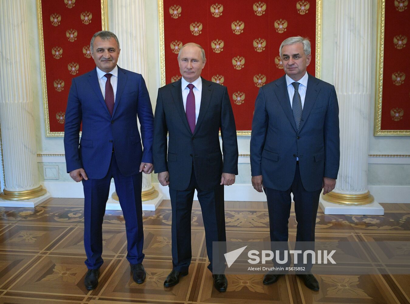 Russian President Vladimir Putin meets with President of the Republic of Abkhazia Raul Khadzhimba and President of South Ossetia Anatoly Bibilov