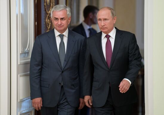 Russian President Vladimir Putin meets with President of the Republic of Abkhazia Raul Khadzhimba and President of South Ossetia Anatoly Bibilov