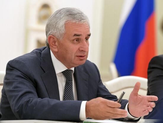 Russian President Vladimir Putin meets with President of the Republic of Abkhazia Raul Khadzhimba and President of South Ossetia Anatoly Bibilov