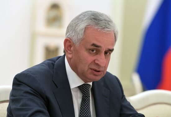 Russian President Vladimir Putin meets with President of the Republic of Abkhazia Raul Khadzhimba and President of South Ossetia Anatoly Bibilov