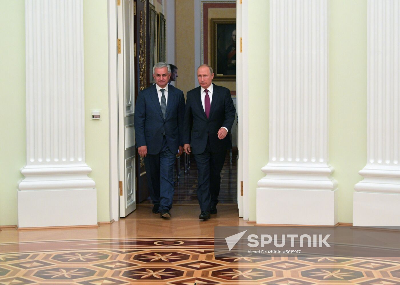 Russian President Vladimir Putin meets with President of the Republic of Abkhazia Raul Khadzhimba and President of South Ossetia Anatoly Bibilov