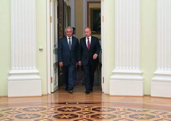 Russian President Vladimir Putin meets with President of the Republic of Abkhazia Raul Khadzhimba and President of South Ossetia Anatoly Bibilov