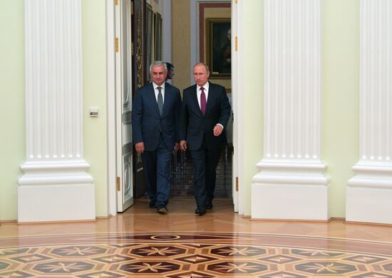 Russian President Vladimir Putin meets with President of the Republic of Abkhazia Raul Khadzhimba and President of South Ossetia Anatoly Bibilov