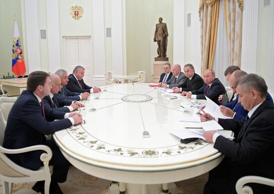 Russian President Vladimir Putin meets with President of the Republic of Abkhazia Raul Khadzhimba and President of South Ossetia Anatoly Bibilov