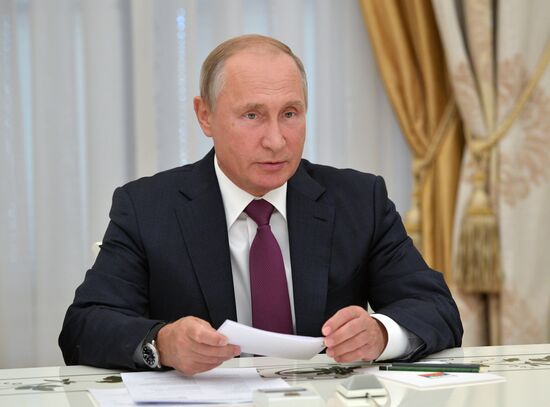 Russian President Vladimir Putin meets with President of the Republic of Abkhazia Raul Khadzhimba and President of South Ossetia Anatoly Bibilov