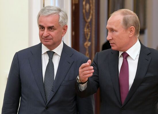 Russian President Vladimir Putin meets with President of the Republic of Abkhazia Raul Khadzhimba and President of South Ossetia Anatoly Bibilov