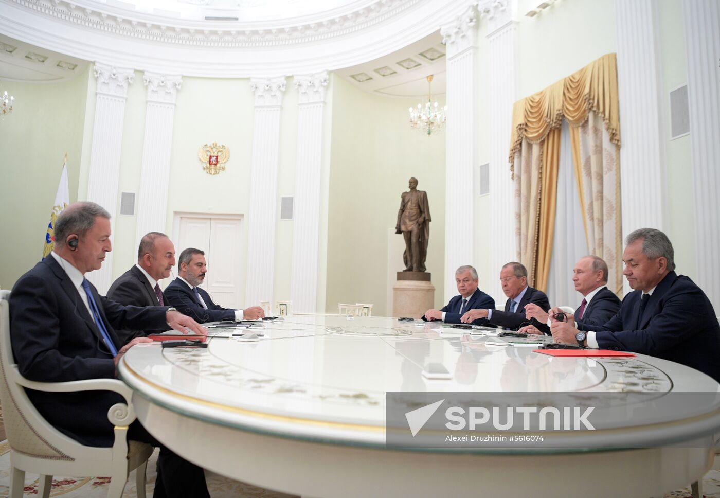 Russian President Vladimir Putin meets with Turkish Foreign Minister Mevlut Cavusoglu