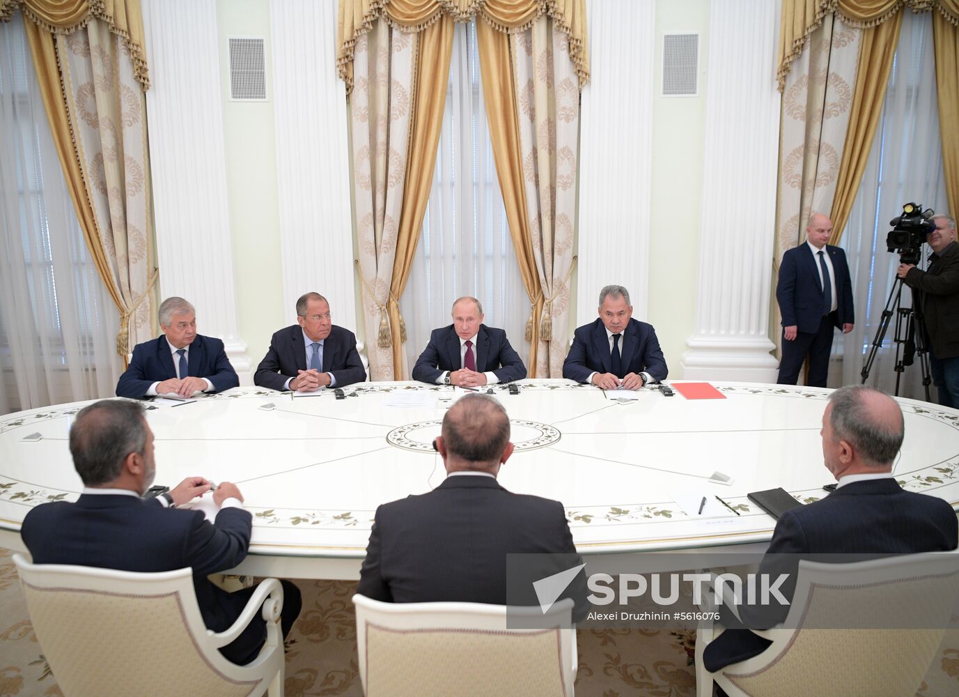 Russian President Vladimir Putin meets with Turkish Foreign Minister Mevlut Cavusoglu