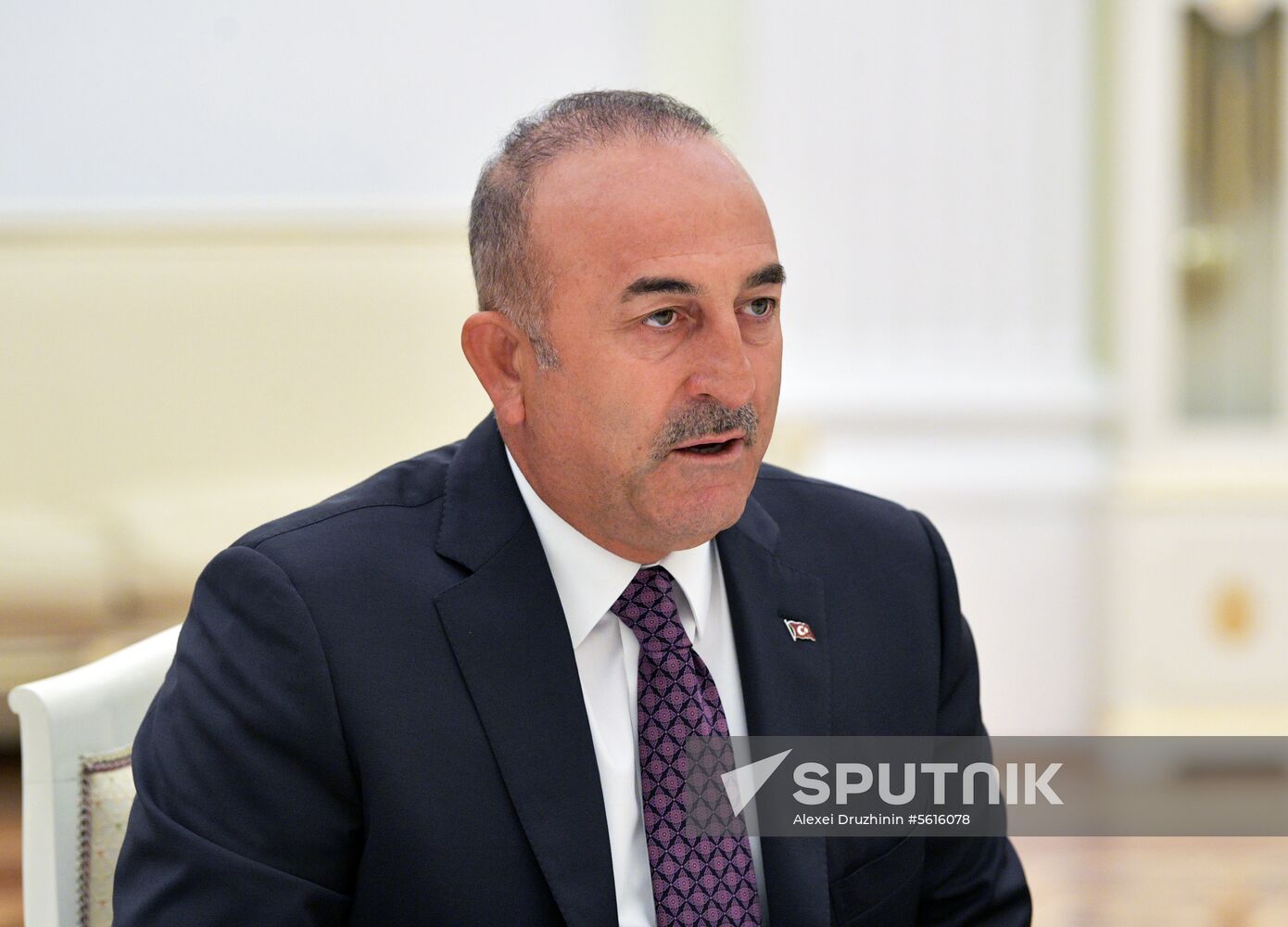 Russian President Vladimir Putin meets with Turkish Foreign Minister Mevlut Cavusoglu
