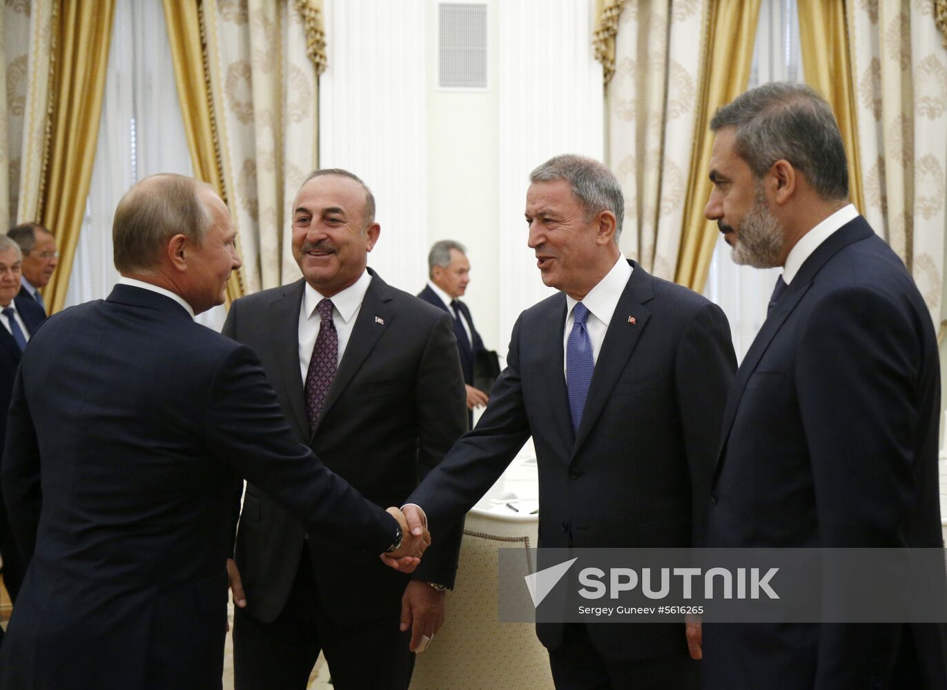 Russian President Vladimir Putin meets with Turkish Foreign Minister Mevlut Cavusoglu