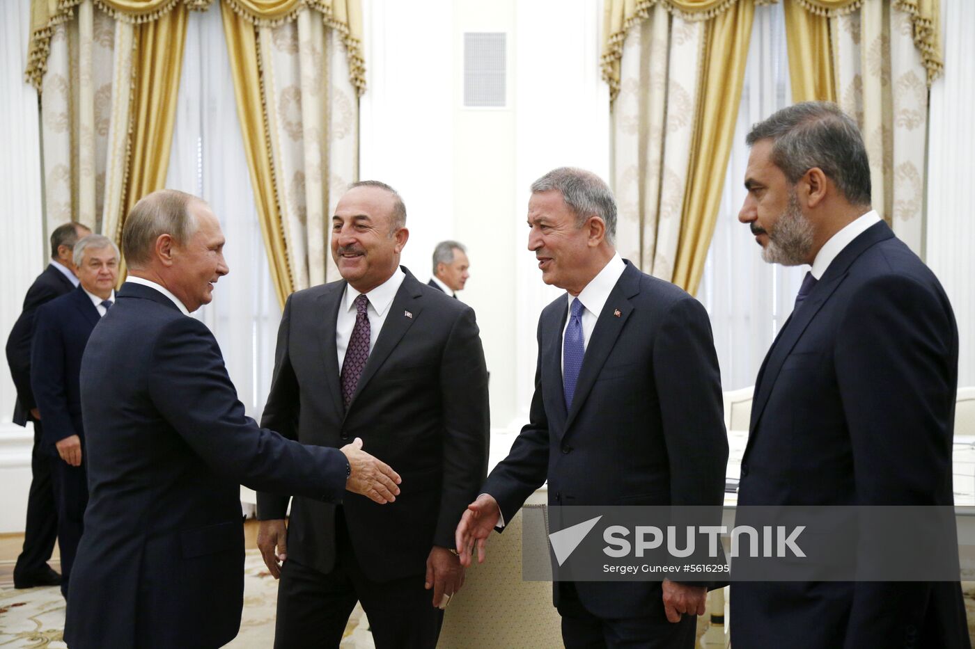 Russian President Vladimir Putin meets with Turkish Foreign Minister Mevlut Cavusoglu