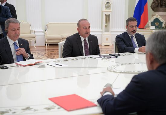 Russian President Vladimir Putin meets with Turkish Foreign Minister Mevlut Cavusoglu